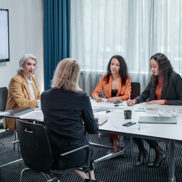 Women at work discussing